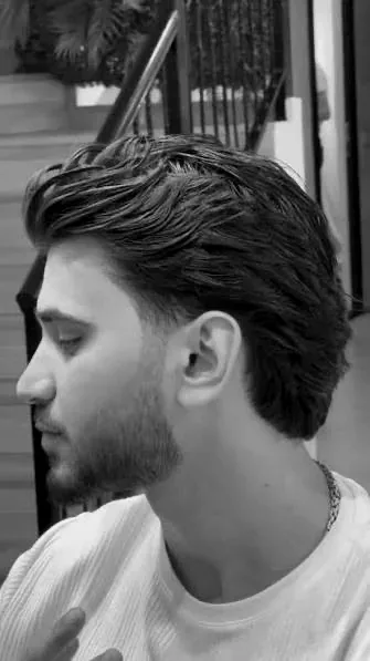 Medium-length flow haircut with a clean outline by Youssef Ouda